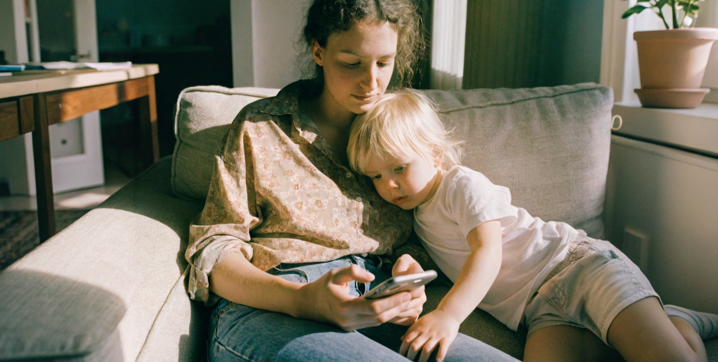 A family using a phone to discover a trusted local business